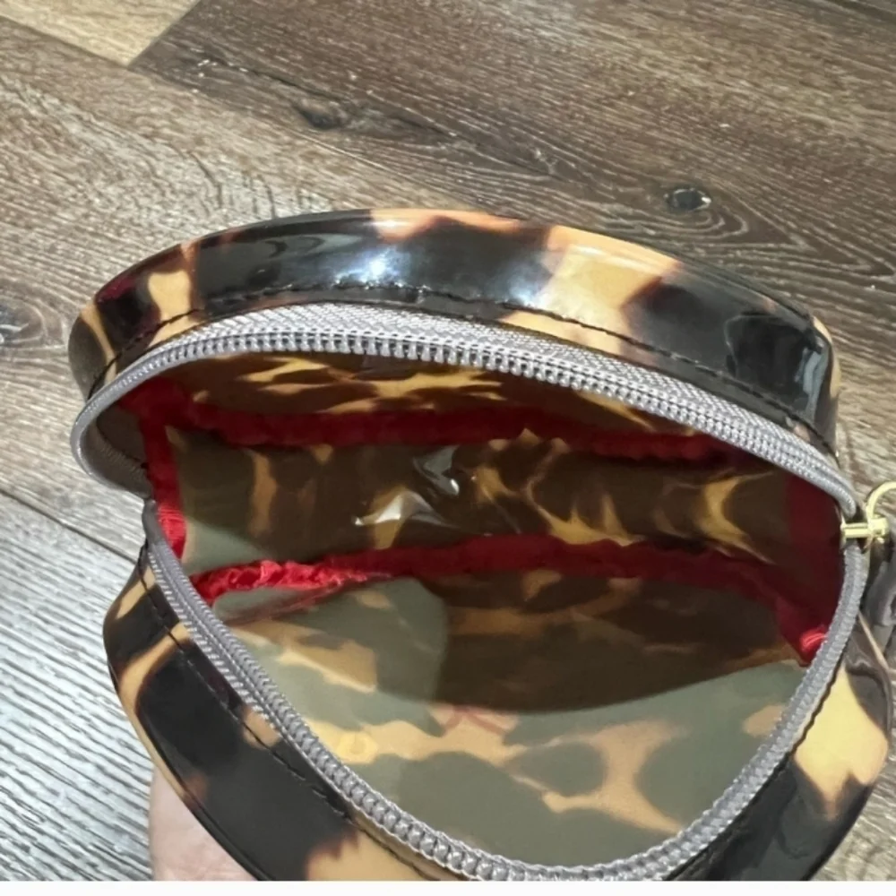 DKNY save the turtle wristlet in excellent condition